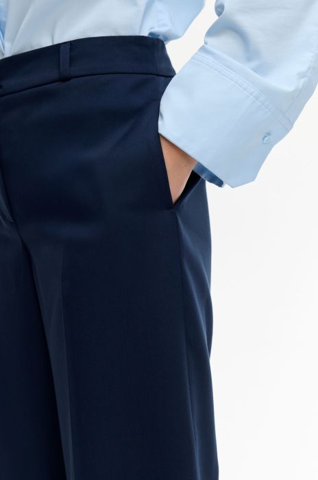 Granatowe spodnie z rozszerzaną nogawką Solar Obraz 3